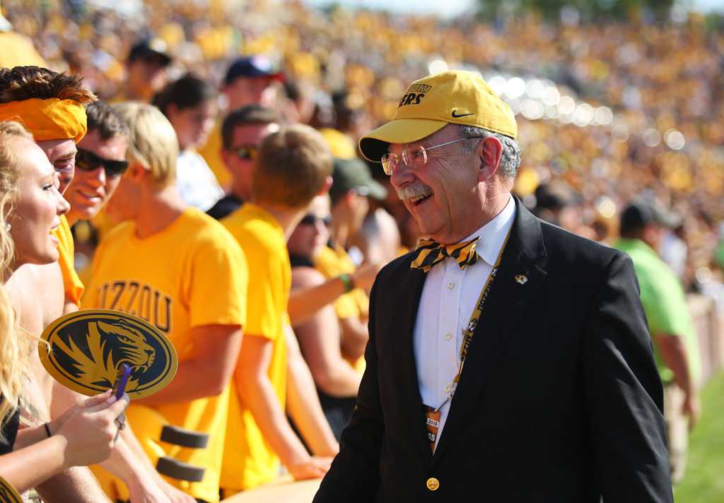 Chancellor Loftin greets students at Missouri football game